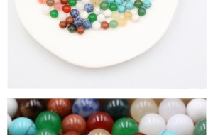 Macro shot of polished 10mm green aventurine and mixed natural stone round beads
