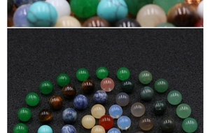 Macro view of 10mm non-porous polished natural green aventurine and multi-color agate beads