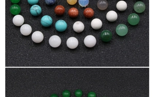 Macro view of assorted 10mm round green aventurine and gemstone beads with numbered marks