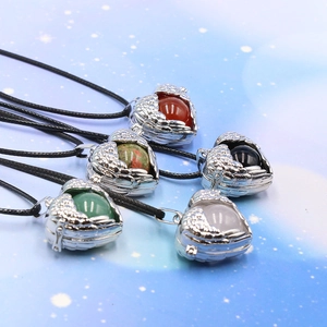 Angel wings heart locket necklaces with colorful round stones on starry background
