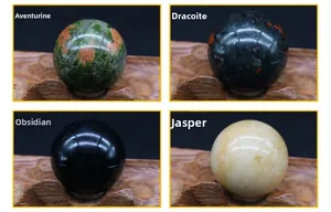 Macro display of unakite dragon blood stone obsidian and topaz 20mm crystal spheres
