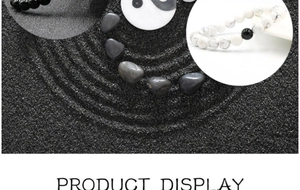 Detailed macro view of Yin Yang themed beaded bracelet with black and white stones
