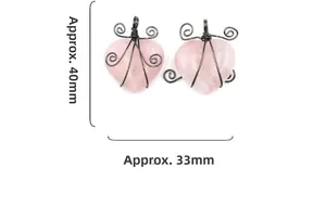 Detail of rose quartz heart pendants with wire wrapping measuring 40mm by 33mm