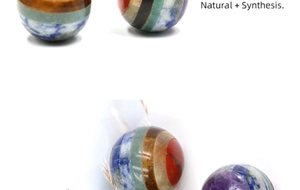 Detailed close-up of a 20mm multi-color striped gemstone sphere for yoga healing