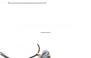 Detail view of 22mm handmade heart-shaped resin pendant with colorful crystal stones