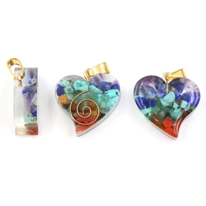 Natural crystal resin heart pendant necklace with chakra stone inlay and gold metal clasp
