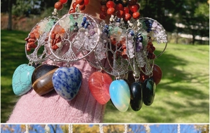 Detailed wire-wrapped Tree of Life pendants with heart-shaped natural stones