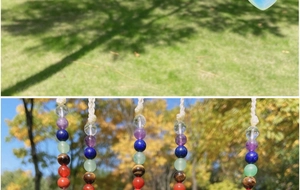 Close-up of a handmade 7 chakra natural stone hanging ornament with colorful crystal beads