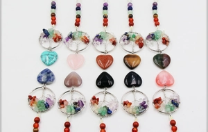 Detailed set of heart-shaped natural stone pendants with Tree of Life wire wrapping