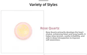 Detailed view of natural rose quartz round stone featuring a golden tree of life symbol