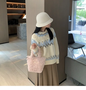 Chic winter style featuring plush handbag, knit sweater, cloche hat and pleated skirt