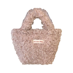 Mini plush faux lamb wool handbag in dusty mauve with stylish central fabric patch