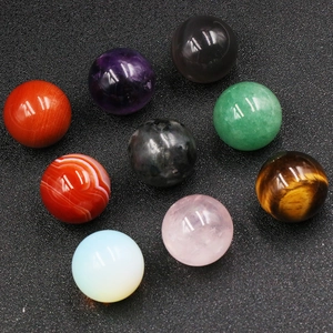 Set of 9 polished 25mm natural crystal balls including amethyst and tiger eye stone