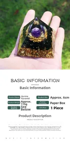 Macro detail of 6cm Orgone Pyramid with amethyst ball and golden lotus in resin
