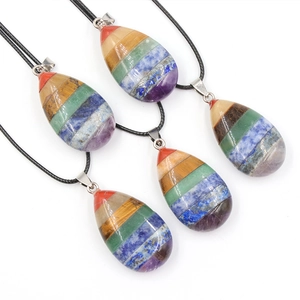 Chakra healing stone necklace with teardrop pendant made of layered colorful gemstones