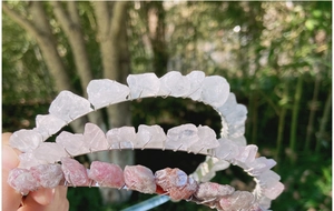 Detail of handmade bohemian tiaras with raw crystals and wire wrapping on silver bands