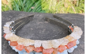Detail showing natural raw crystal clusters secured on a triple-layer silver bridal crown