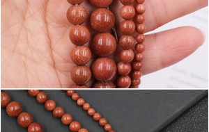 Close-up of golden sand stone beads in 4mm to 10mm sizes for DIY jewelry making
