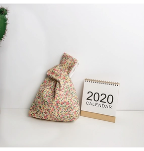 Japanese floral knot wrist bag made of cotton fabric for carrying keys and phones