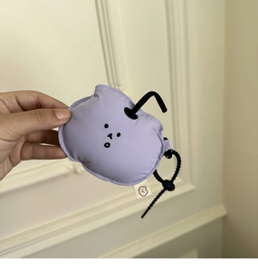 Soft purple plush cloud pouch for earbuds with cute cartoon face and durable keychain