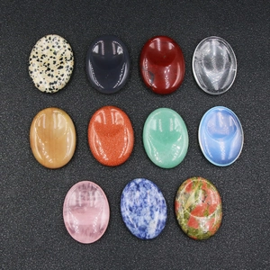 Set de 11 piedras de masaje de cristal natural ovaladas con muesca para el pulgar
