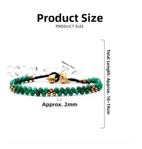 Detail of bohemian braided bracelet with green beads and gold charms, length 18-19cm