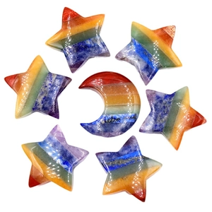 Polished rainbow chakra stones set with seven moon and star shaped healing crystals
