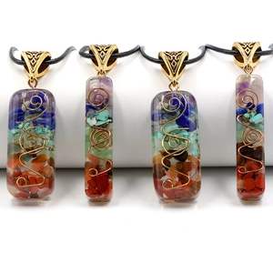 Handmade 7 Chakra natural crystal chips resin necklace with copper spiral on black cord