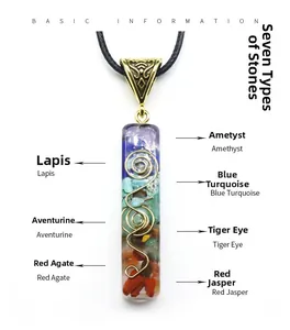 Macro detail of 7 chakra natural stone pendant with gold wire wrap and black wax cord