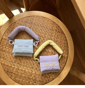 Quilted mini earphone bags with chunky handles in dopamine pastel color combinations