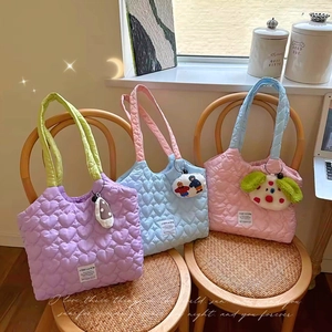 Quilted heart canvas tote bags in lavender, blue, and pink with cute plush pendants