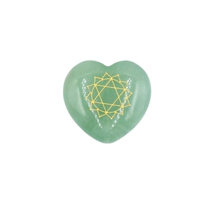 Polished green aventurine heart stone with engraved golden Anahata heart chakra symbol