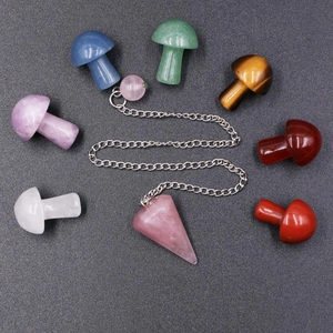 Chakra set with rose quartz pendulum and seven colorful crystal mushroom carvings
