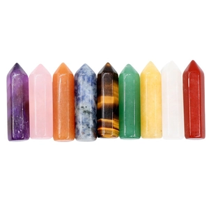 Set of 9 colorful natural hexagonal crystal pillars including amethyst and tiger eye stone