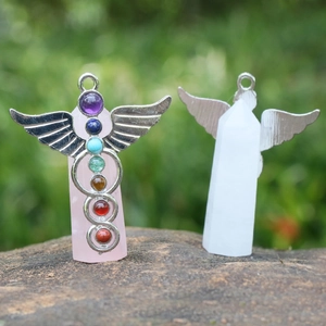 Natural rose quartz and clear crystal hexagon pillars with silver angel wings and chakra stones
