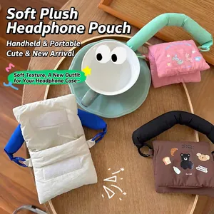 Mini quilted cotton earphone pouches with cute animal embroidery and thick handles