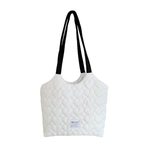 Quilted heart pattern tote bag in cream white with contrast black straps for women