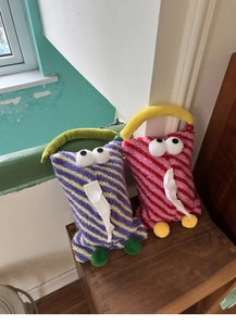 Funny plush car tissue bag with large eyes decoration in purple and pink stripes
