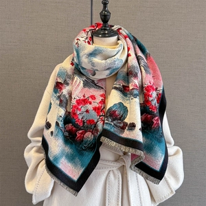 Sciarpa invernale in finto cashmere con motivo floreale jacquard rosso e blu e frange