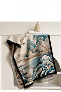 Detailed view of jacquard tapestry with crane landscape design and fringe edges