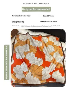Detail view of 68x68cm floral square scarf with orange base and vintage pattern