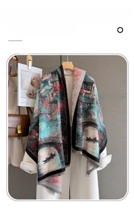 Detailed texture of imitation cashmere scarf with blue-pink landscape print and fringe