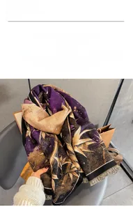Detailed close-up of purple bamboo jacquard imitation cashmere scarf with tassel edges