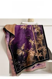 Detail of purple scarf featuring golden bamboo leaf jacquard and fine tassel edges