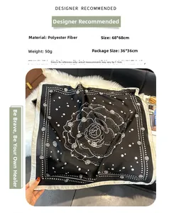 Close-up of 68x68cm square scarf with black and white rose pearl print and dot patterns