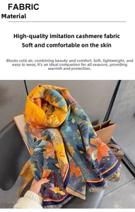 Dettaglio dello scialle in finto cashmere con fiori multicolori e finiture con frange