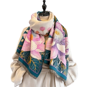 Elegant oil painting style cashmere scarf with lotus print and tassels on a model coat