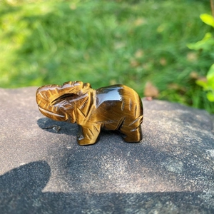 Tiger eye gemstone elephant figurine hand-carved with natural polished textures
