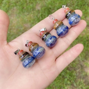 Handheld seven chakra natural stone gourd pendant with colorful layered crystal minerals