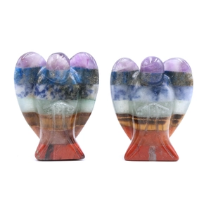 Set of two carved natural crystal angel statues with rainbow chakra stone layers